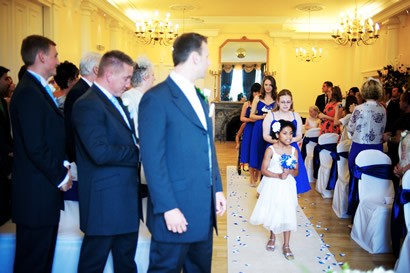 Bridesmaids coming down the aisle