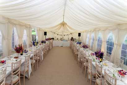Table set up in marquee