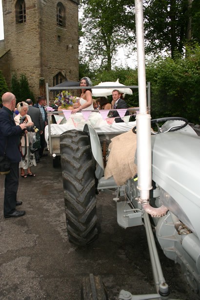 Leaving church by tractor