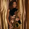 Click for a bigger image of Saxophonista
