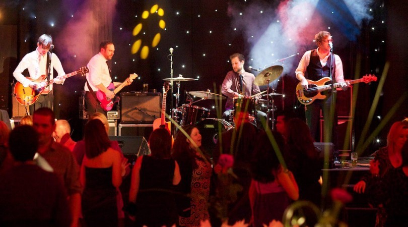 Hipster rocking out a wedding